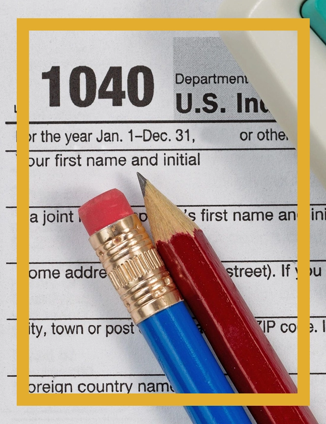 A pencil and some paper on top of the 1 0 4 0 form.